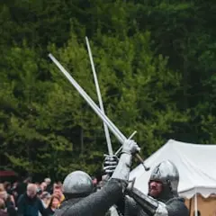 Two swords grinding against each other in a fierce battle